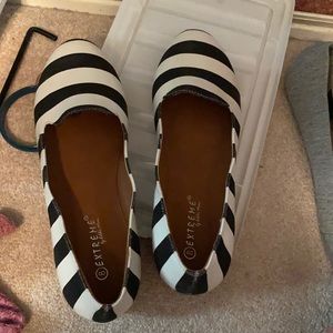 Women’s flat black and white striped